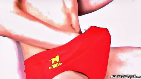 Gavin Winters in red swimsuit hugging white man in interracial threesome