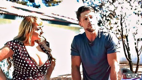 Busty blonde in polka dot dress shows massive cleavage to muscular man outdoors