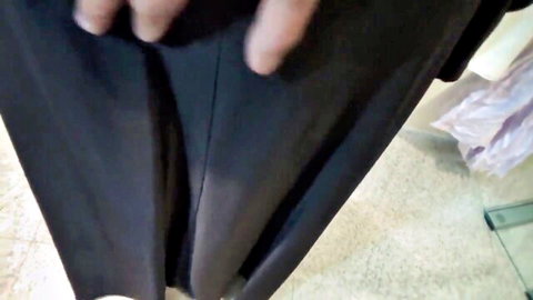 Hands pulling down tight black pants exposing big brown Indian ass cheeks