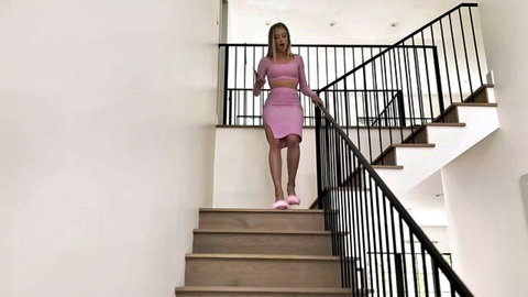 Barbie in sexy pink crop top and mini skirt, teasing with fluffy slippers in POV foot fetish