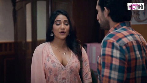 Desi babe in pink embroidered salwar kameez chatting intimately with teacher