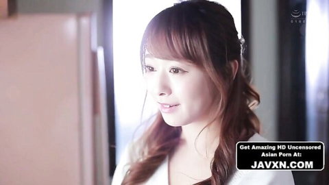 Smiling Japanese MILF with reddish hair in white top, JAV gangbang preview