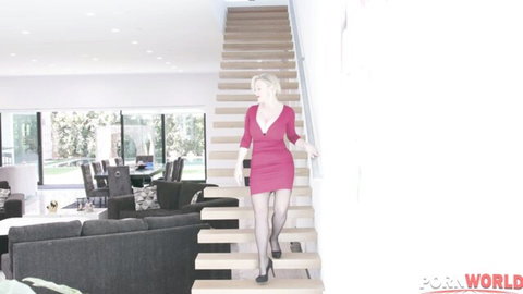 Blonde MILF Dee Williams in tight red dress and stockings walking up stairs