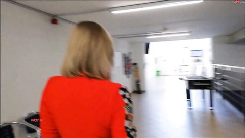 Blonde star Lilli Vanilli in orange checkered top, teasing from behind