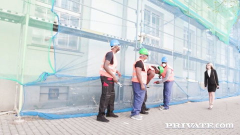 Blonde woman in tight black dress approached by four construction workers for rough gangbang
