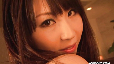 Seductive Japanese AV idol closeup with glossy lips and alluring eyes teasing for cock