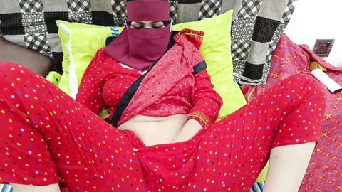 Sobia Nasir in red hijab spreading legs exposing shaved pussy