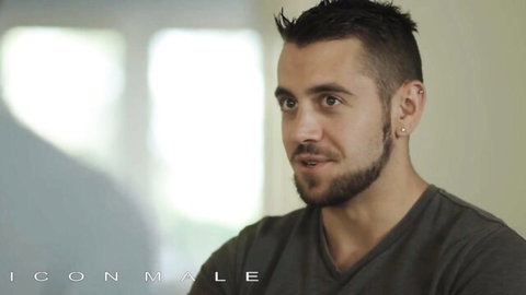 Dante Colle in seductive shirt pose, eyeing Johnny B's ass