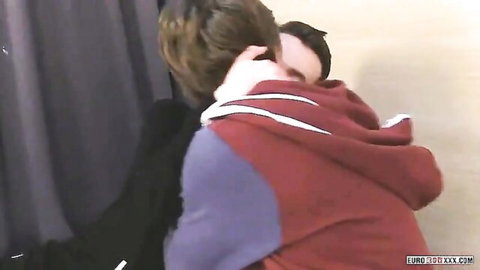 Ethan and Michael in passionate gay embrace, uncut hunks hugging intimately