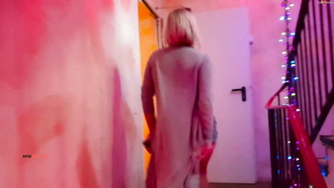 Lilli Vanilli teases with curvy ass in open gray cardigan, blonde hair from behind