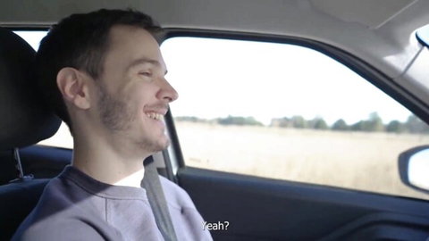 Sara Sky and Sancho smiling in car on road trip POV adventure