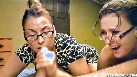 MILF in glasses sucking toy with young brunette laughing, See Mom Suck cumshot comp