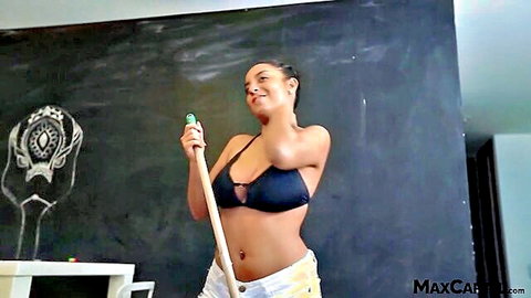 Curvy ebony teen with big natural tits posing in black bikini and white shorts
