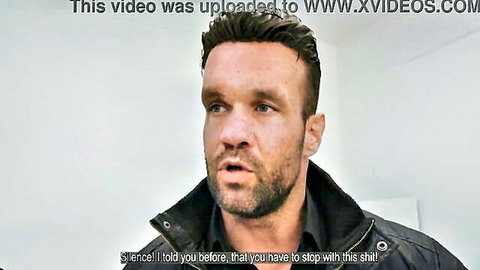 Rugged bearded man in black jacket yelling 'silence stop this shit' with xvideos watermark
