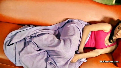 Busty MILF Ayden Blue resting in pink tank top under blanket