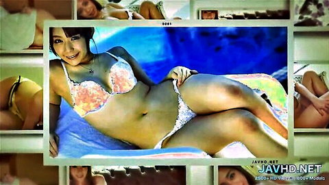 Japanese teen in frilly pink bikini spreading legs teasing pussy on blue mat