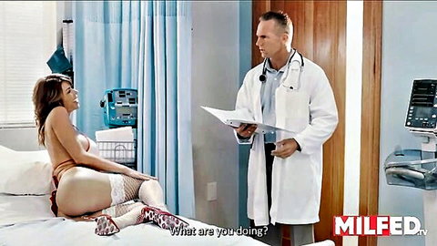 Sexy MILF patient in lingerie spreads legs exposing hairy pussy to doctor during medical exam
