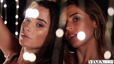 Liya Silver and Agatha Vega seductive close-up in nightclub lights