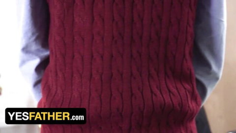 Dakota Lovell in red sweater vest dominated by priest