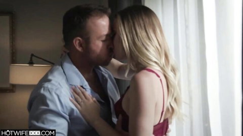 Emma Sirus in red lingerie passionately kissing man