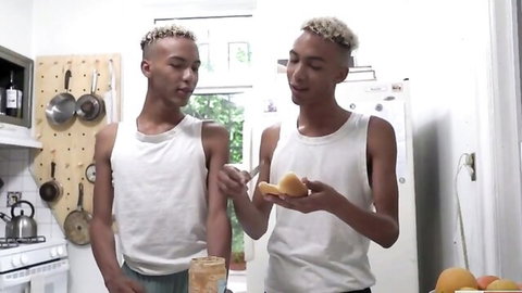 Two blond-haired Black twinks in tank tops making a sandwich before uncle fun