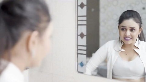 Sucharita Bhattacharya in sexy white jacket with cleavage, bathroom mirror pose
