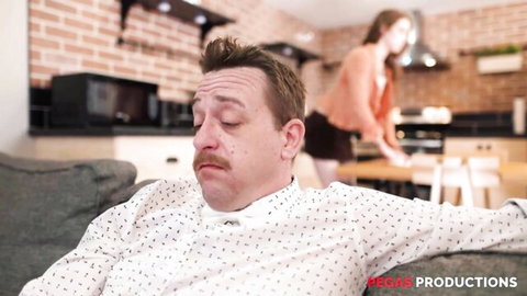 Eden Ivy as stepdaughter bending over teasing stepdad on couch