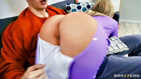 Dan Dangler blonde with big ass exposed in purple dress, bent over for anal play