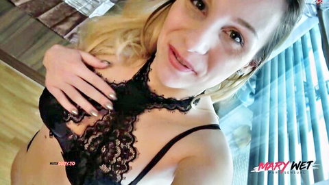 Blonde MaryWet teases in black lace lingerie, close-up smile