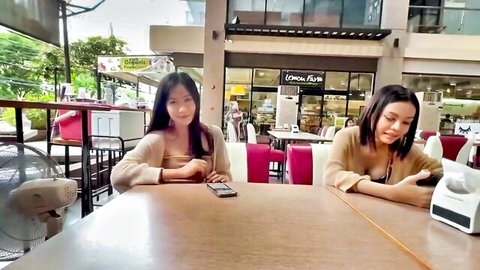 Two sexy Asian girls in off-shoulder tops teasing in steamy HD split scene