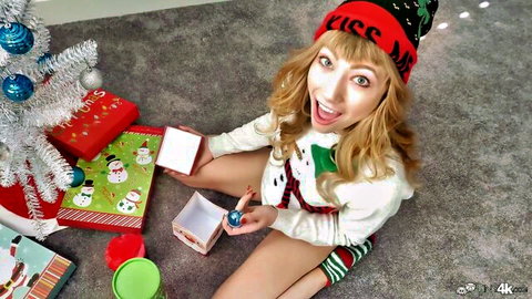 Blonde Ivy Wolfe in sexy elf outfit with Christmas gifts, petite tease