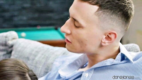 Dane Jones close-up profile in intimate moment with partner, shirt open