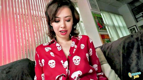 Asia Rivera hot Asian babe in open red skull shirt cleavage