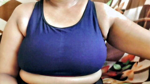 Riya's curvy Indian Desi aunty in blue tank top, big natural tits cleavage