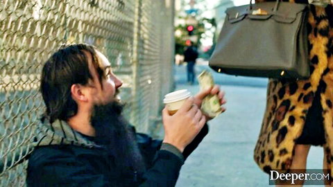 Lena Paul in fur coat receives cash from bearded man on urban street