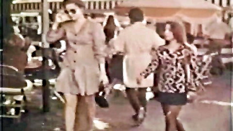 Retro women in mini dresses and sunglasses walking in vintage street scene, teasing big natural tits XXX