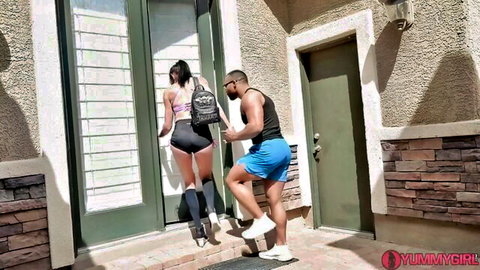 Sofie Marie in tight shorts and sports bra entering room with muscular stud