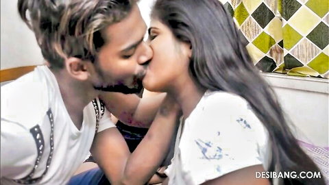 Hot Indian couple passionately French kissing on bed in steamy desi foreplay