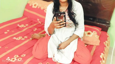 Desi Fantasy posing in white embroidered top and red pants selfie