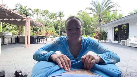 Adriana Maya teases cock outdoors in blue top, hand on bulge