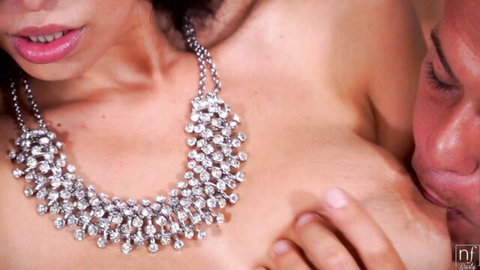 Stunning babe in sparkling crystal necklace moans in ecstasy as lover passionately kisses her neck