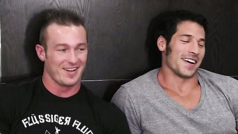 Two muscular hunks smiling: Italian stallion and muscle hunk in casual shirts
