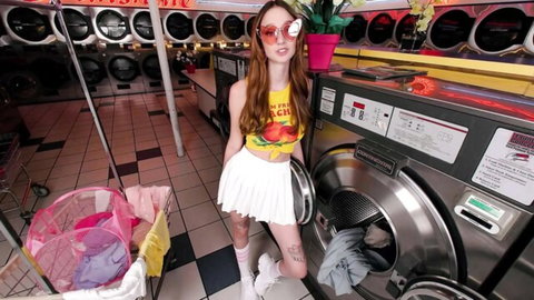 Melanie Marie in panty hunter laundromat tease, redhead in mini skirt