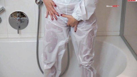 DeutscheHausfrau German MILF in wet shiny PVC suit teasing crotch in bathroom