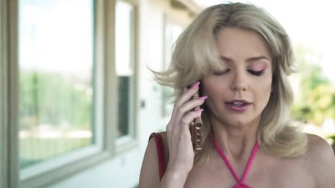 Blonde MILF Beverly Hills on phone in pink halter top