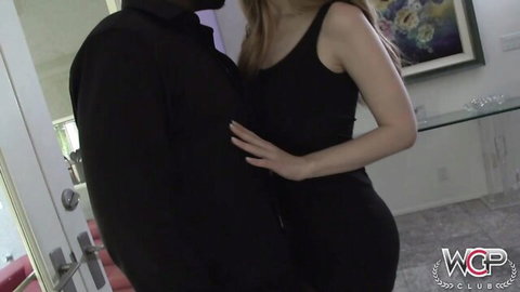 Stella Cox in black dress embraces black man in steamy interracial preview