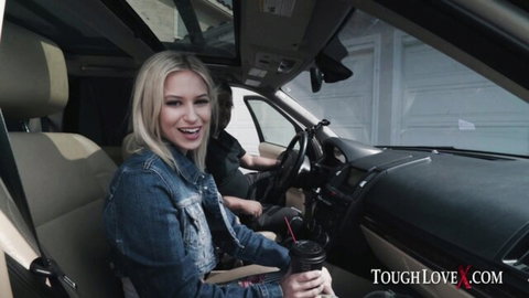 Kiara Cole blonde in denim jacket, smiling in car passenger seat