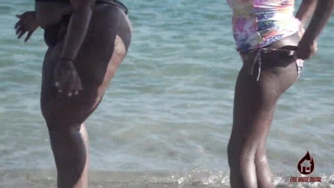 Ebony couple Jummy Tee in steamy beach tease, behind scenes