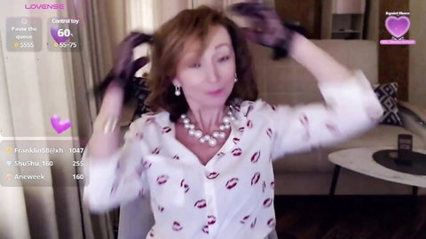 Sexy MILF in lipstick print blouse lifts hair with black gloves on webcam tease