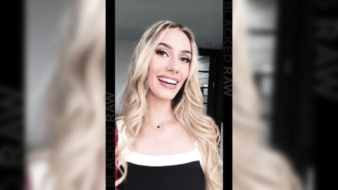 Smiling blonde babe in sexy black top poses seductively for BlackedRaw interracial porn